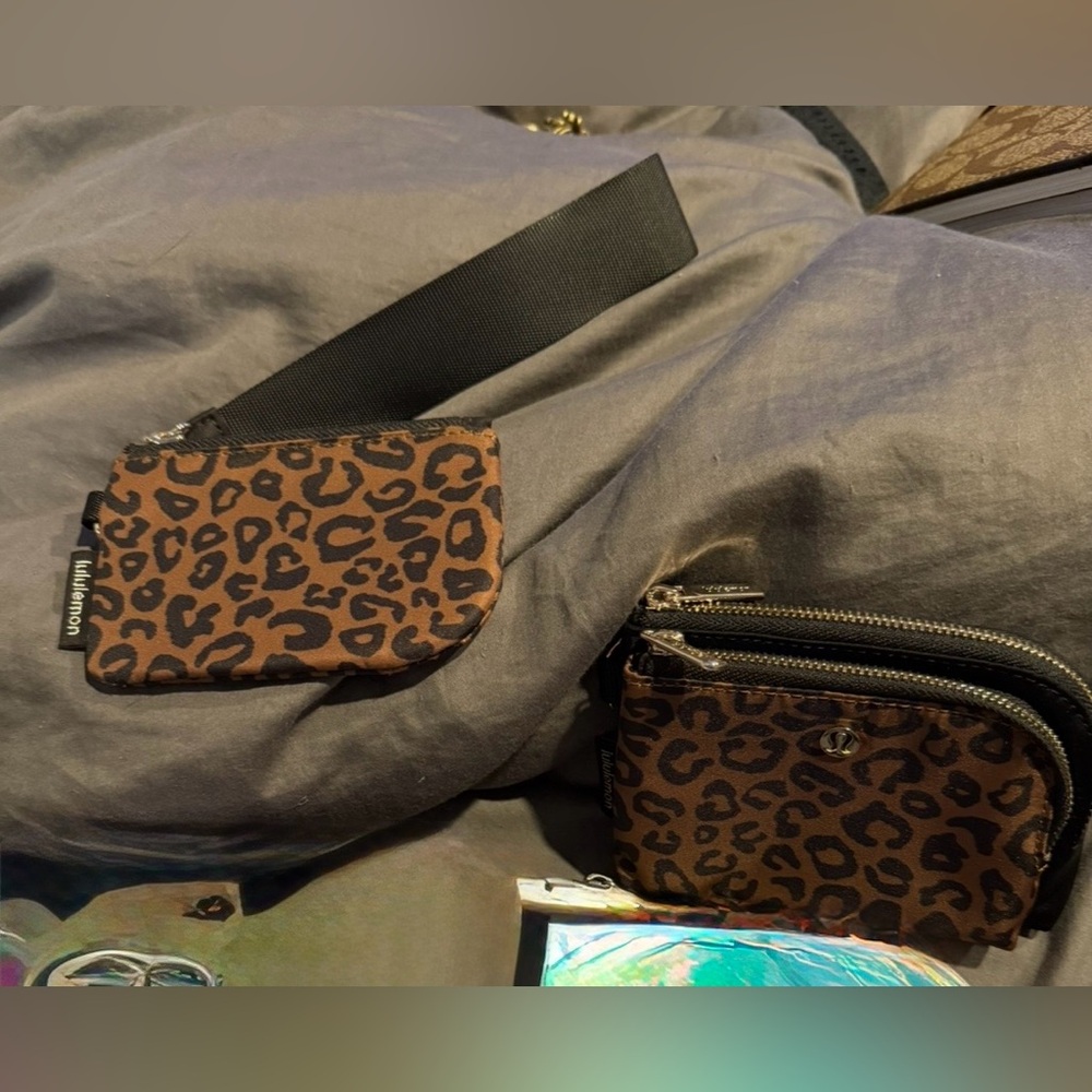 Two Lululemon wallet/pouches (leopard print)